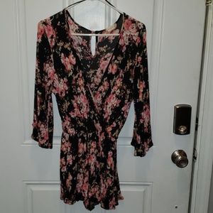 Black floral print v-neck romper